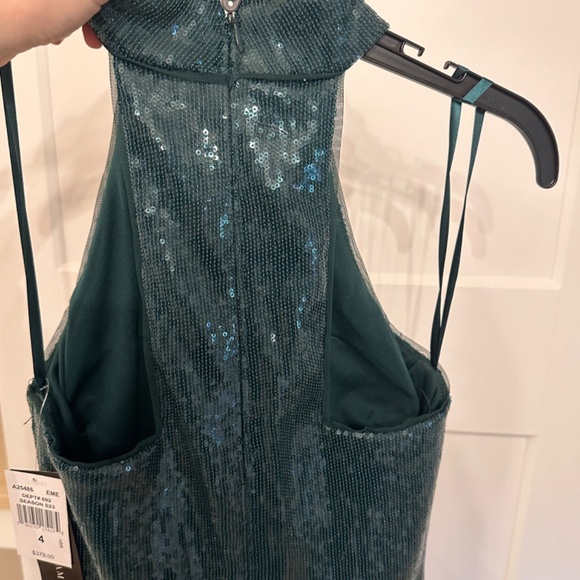 Green formal sequin long halter neck dress. Betsy and Adam